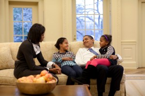 President Barack Obama relaxes on a sofa in the Oval Office with wife Michelle and daughters Malia and Sasha, Feb. 2, 2009. (Official White House Photo by Pete Souza) This official White House photograph is being made available for publication by news organizations and/or for personal use printing by the subject(s) of the photograph. The photograph may not be used in materials, advertisements, products, or promotions that in any way suggest approval or endorsement of the President, the First Family, or the White House.